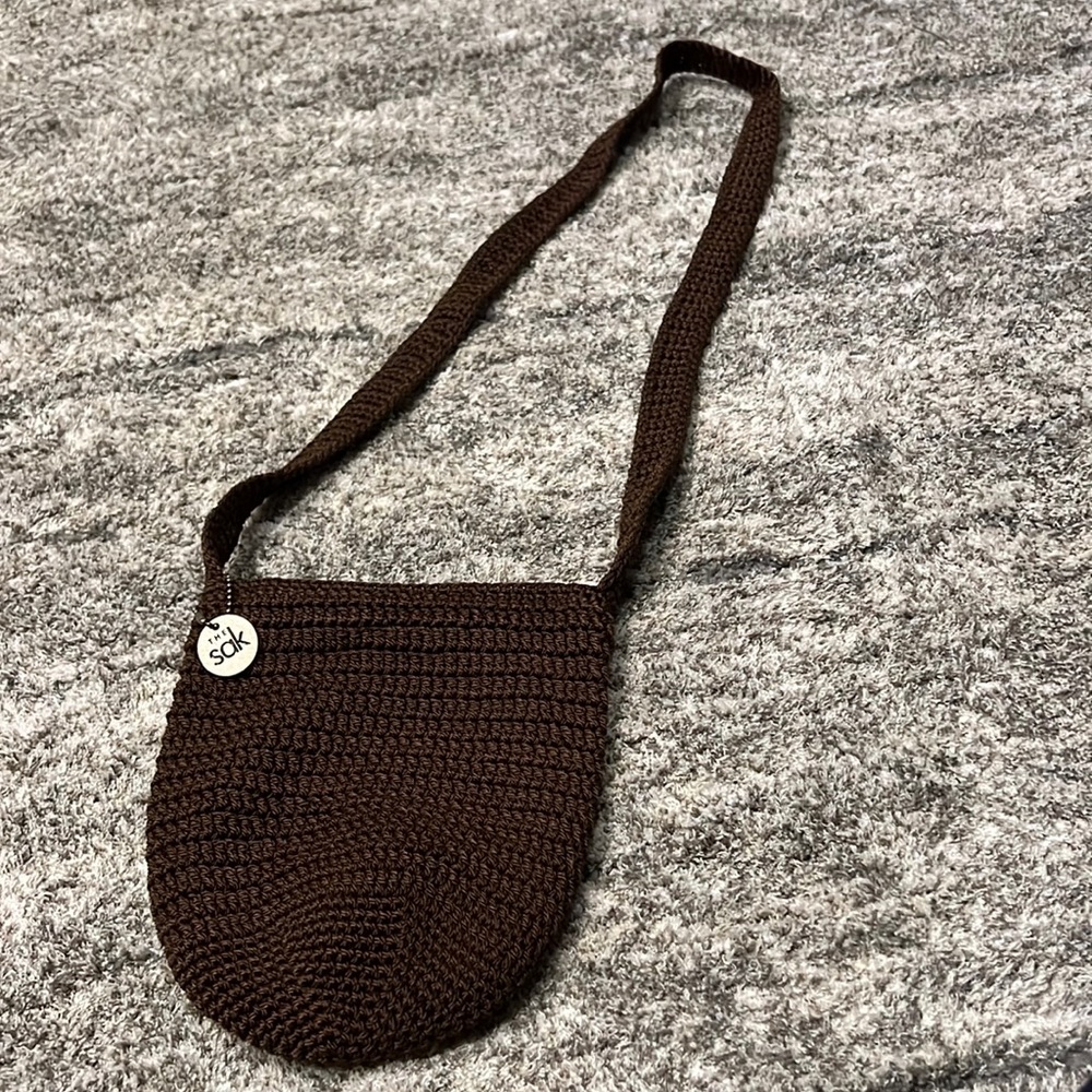 The Sak brown crocheted cross body bag